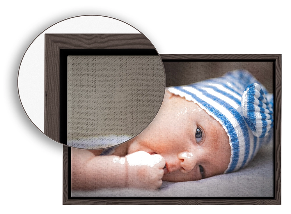 A canvas in a floater frame, with a close-up of the shadow gap at one corner